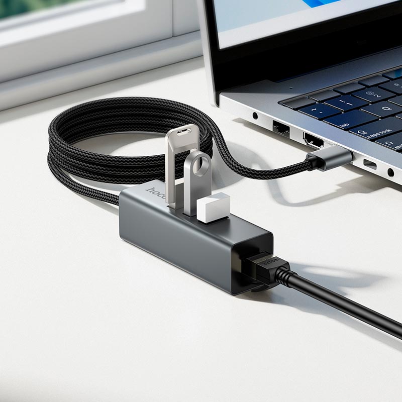 Розширення інтерфейсів 4 в 1: три порти USB 2.0 та стабільний інтернет RJ45
